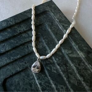Elegant Pearl Necklace with Silver Pendant